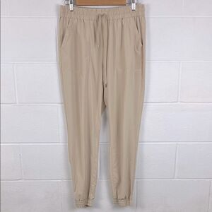 Aritzia Tna women’s speed tan high waisted joggers performance athletic size L